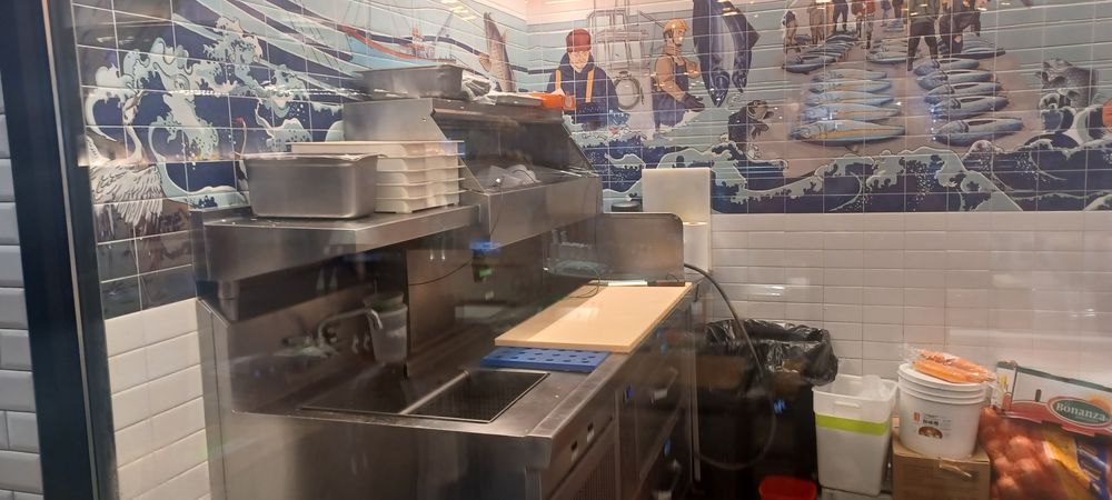 Food service equipment in a commercial kitchen